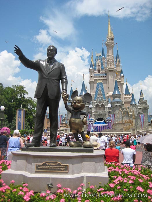 Walt Disney & Mickey Mouse statue in front of Cinderella's Castle Walt Disney & Mickey Mouse statue in front of Cinderella's Castle
